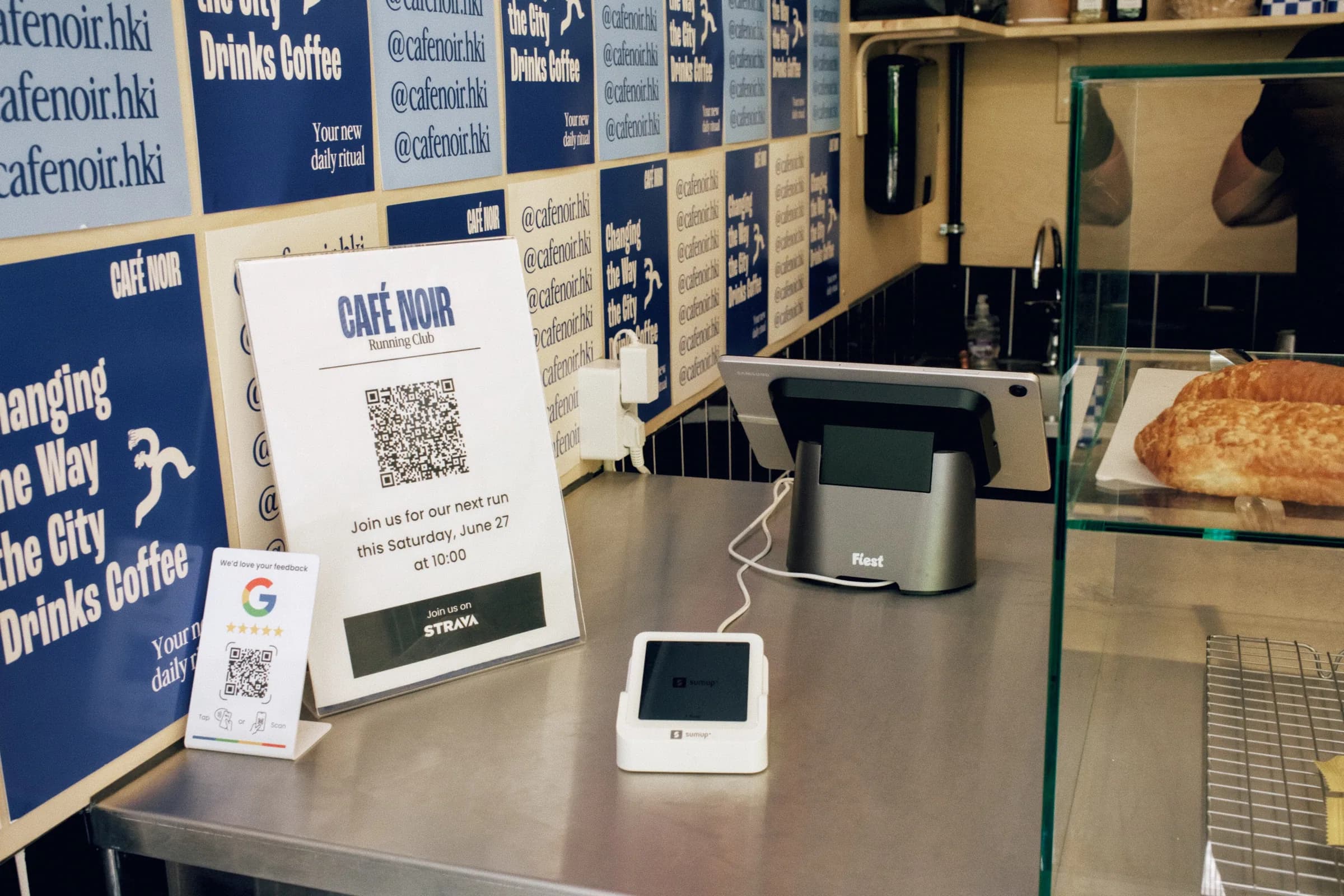 Café Noir counter with the Fiest point of sale and payment reader visible