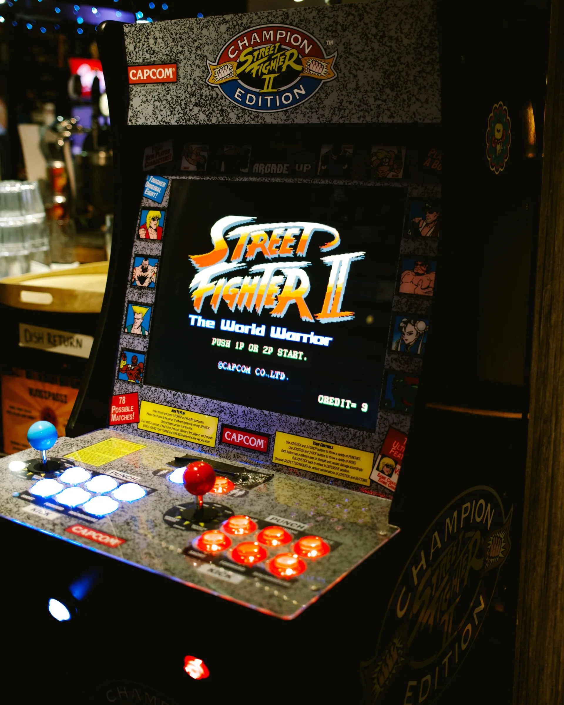 Retro arcade cabinet inside Café Boardgame