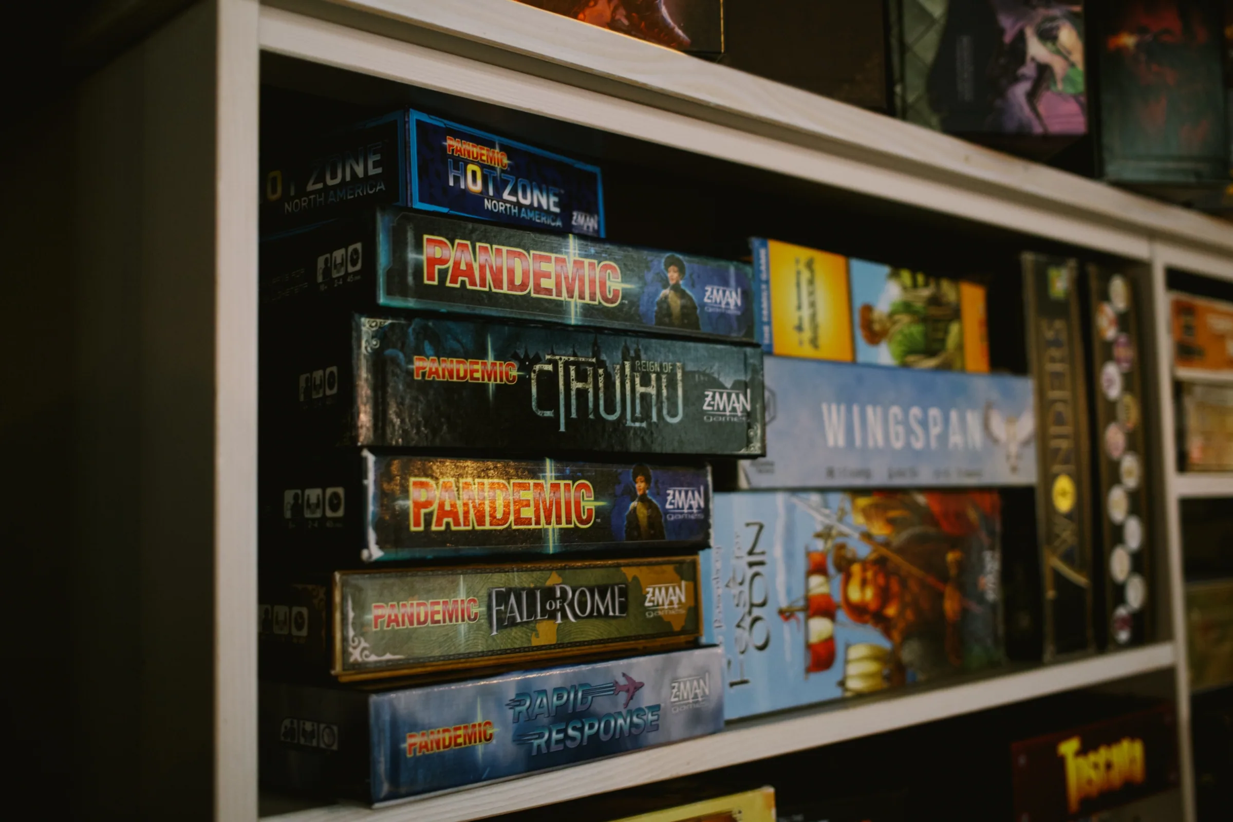 Shelves filled with board games at Café Boardgame