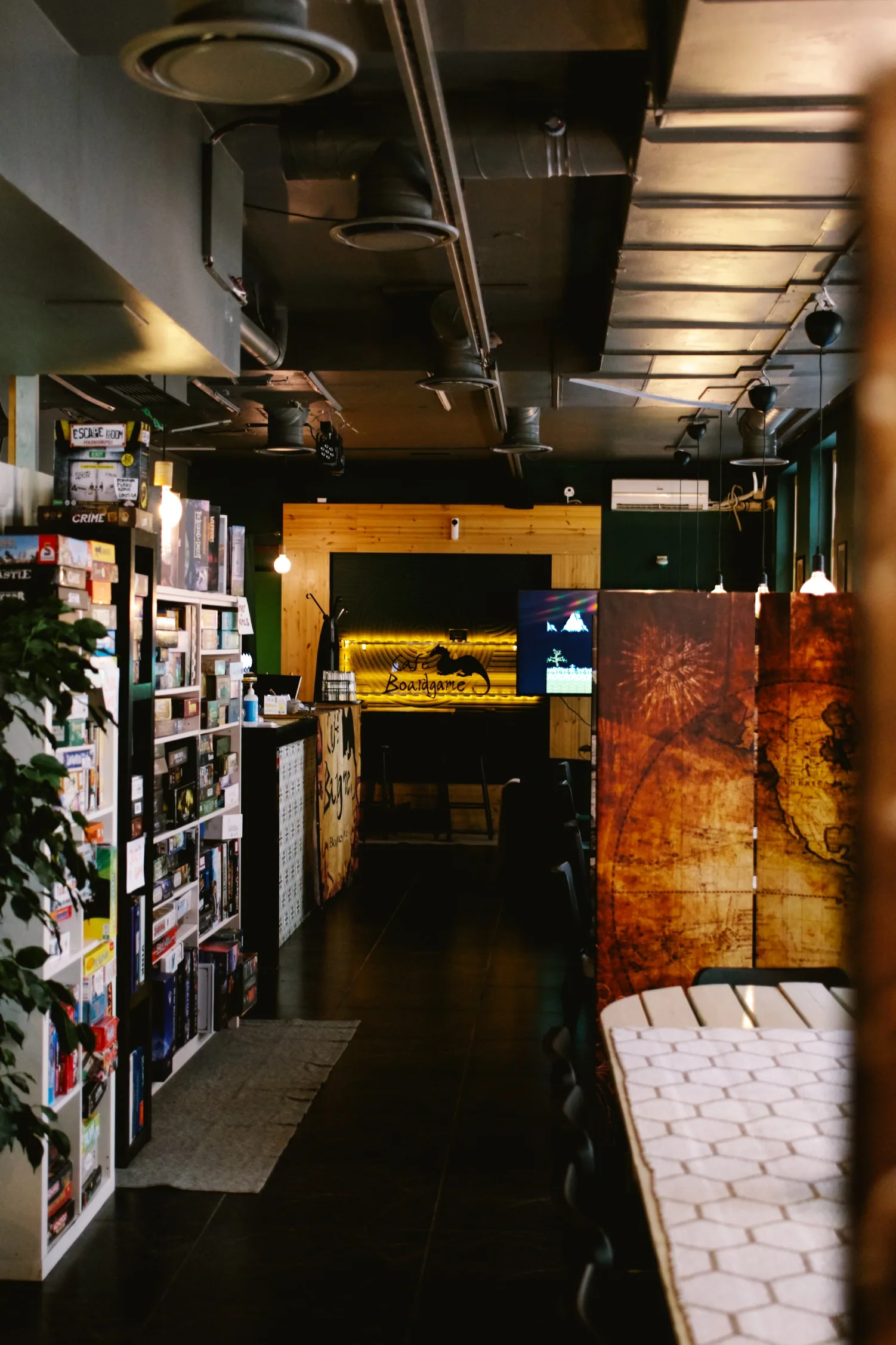 Café Boardgame interior entrance with the game room beyond